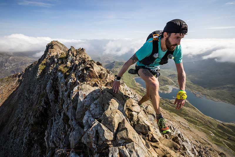 A very focused Simon Roberts on Crib Goch leading on day one of the 2021 Montane Dragons Back Race copyright No Limits Photography