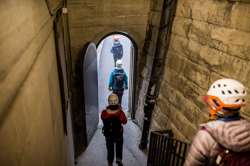 Participants exiting through a footpath tunnel just below the Göschenen tunnel to reach the via ferrata
