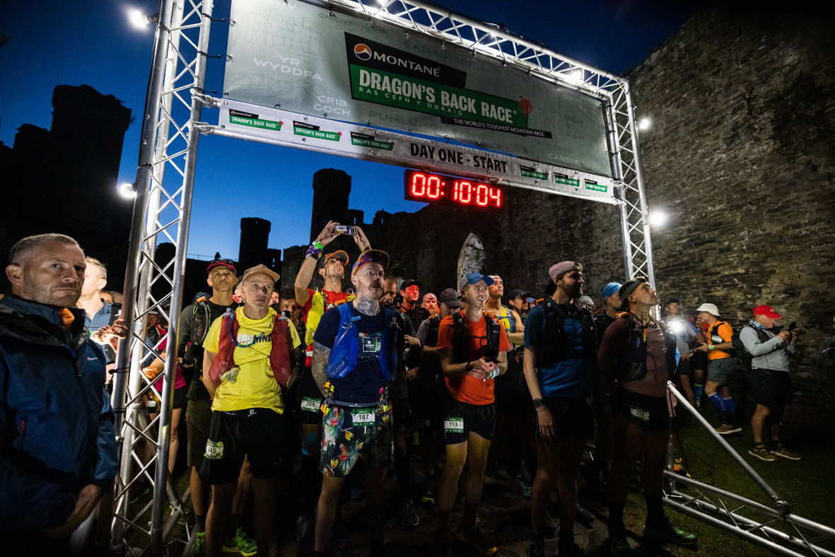 Ultra runners line up in Conwy Castle for the start of the Montane Dragons Back Race 2022 C No Limits Photography